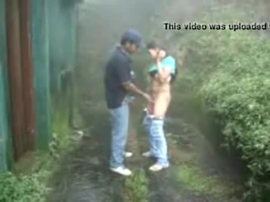 Indian girl sucking and fucking outdoors in rain